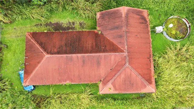 a backyard of a house with lots of green space