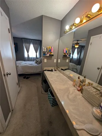 a room with furniture and a flat screen tv