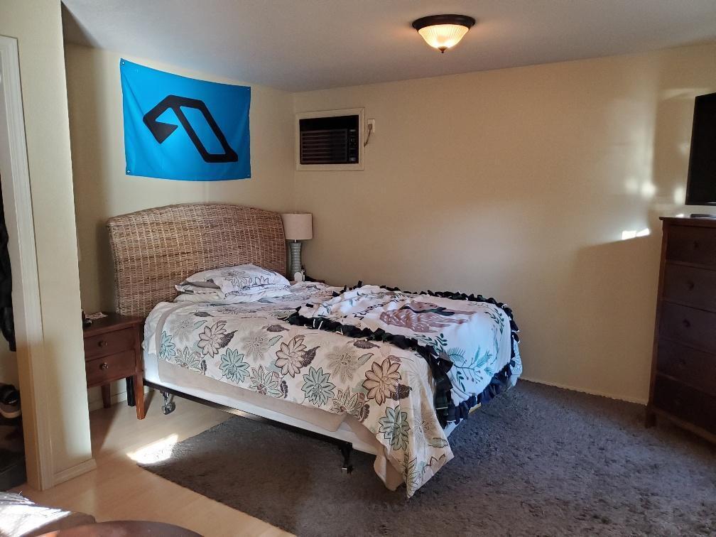 75 Wimer Street Ashland, OR 97520 - Photo 43 of 44 a bedroom with a bed and a flat screen tv