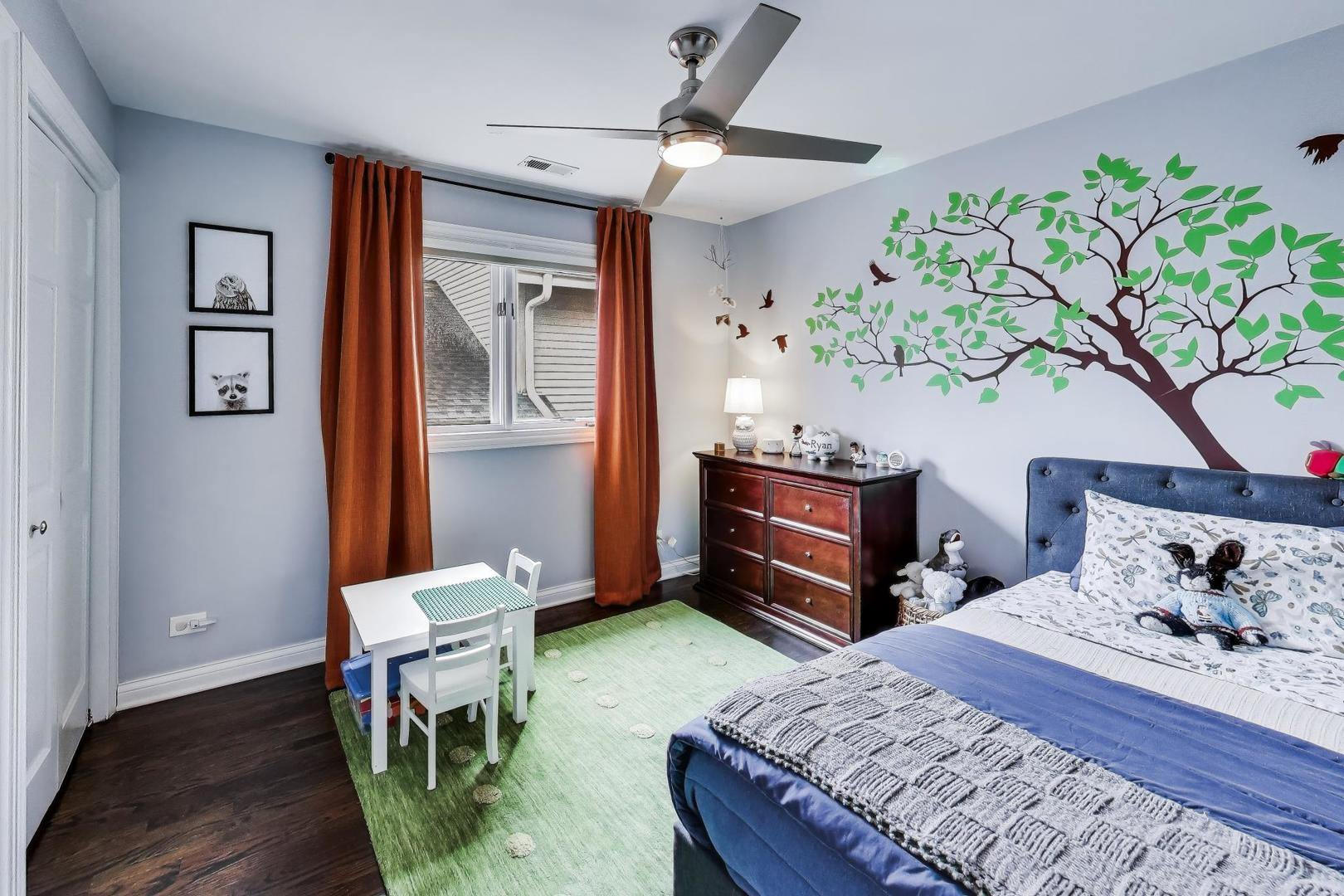 1029 Prairie Avenue Park Ridge, IL 60068 - Photo 14 of 25 a bedroom with a bed table and a window