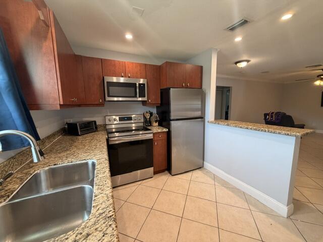 1983 Juno Road North Palm Beach, FL 33408 - Photo 1 of 15 IMG_3912