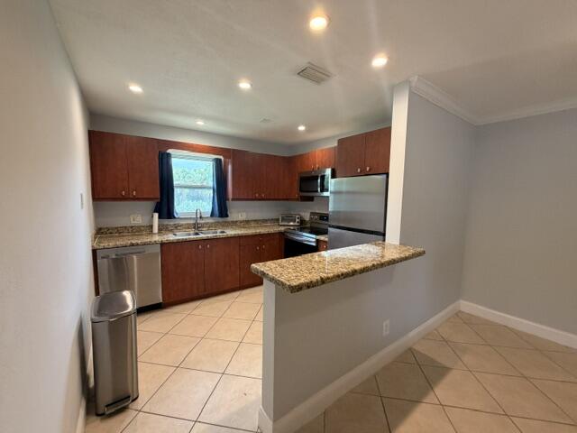 1983 Juno Road North Palm Beach, FL 33408 - Photo 2 of 15 IMG_3909