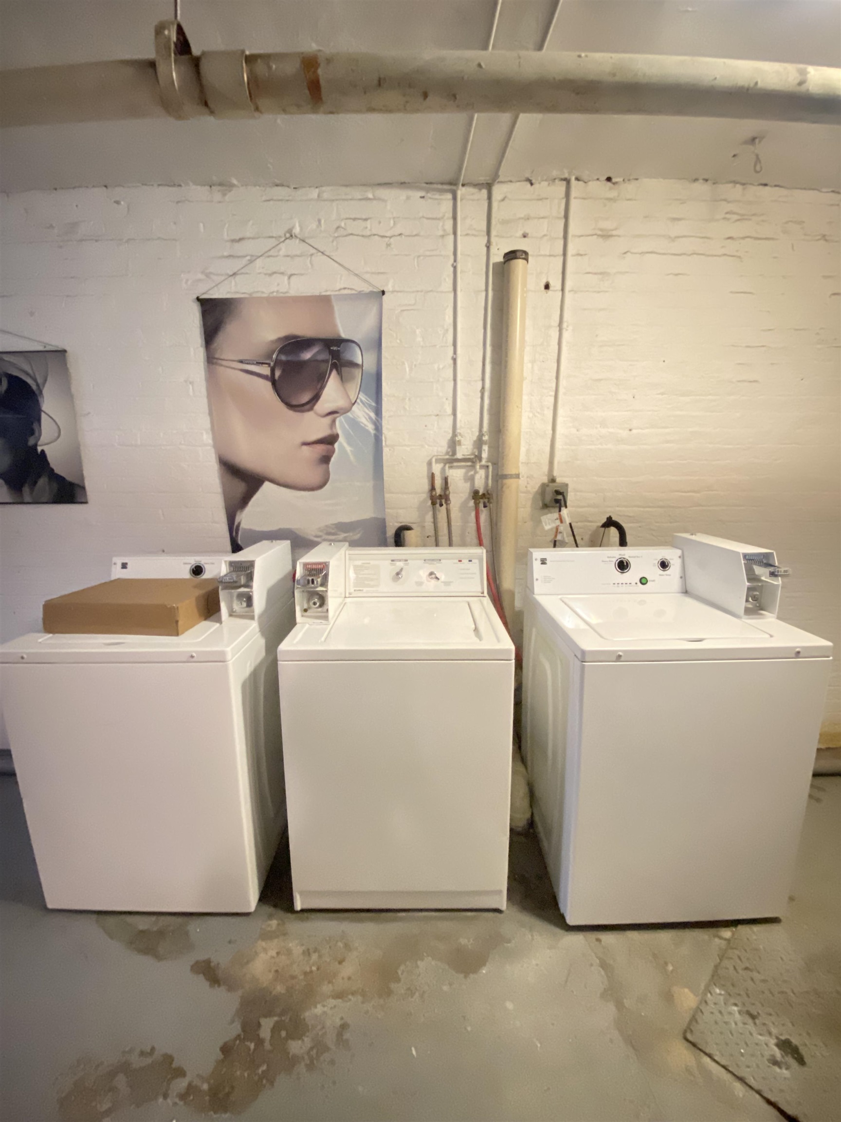 410 Washington Street, Unit 7 Hoboken, NJ 07030 - Photo 5 of 6 a white house sitting next to a white sink