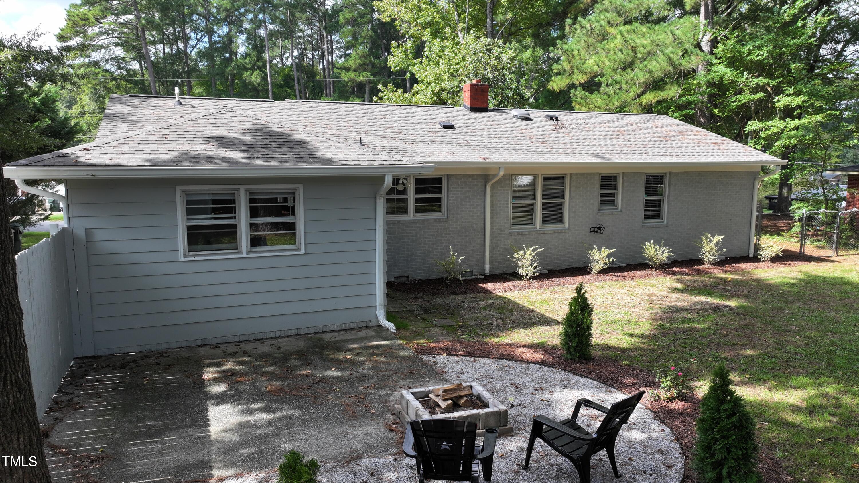 607 Nellane Drive Garner, NC 27529 - Photo 29 of 35 a view of a house with backyard and sitting area