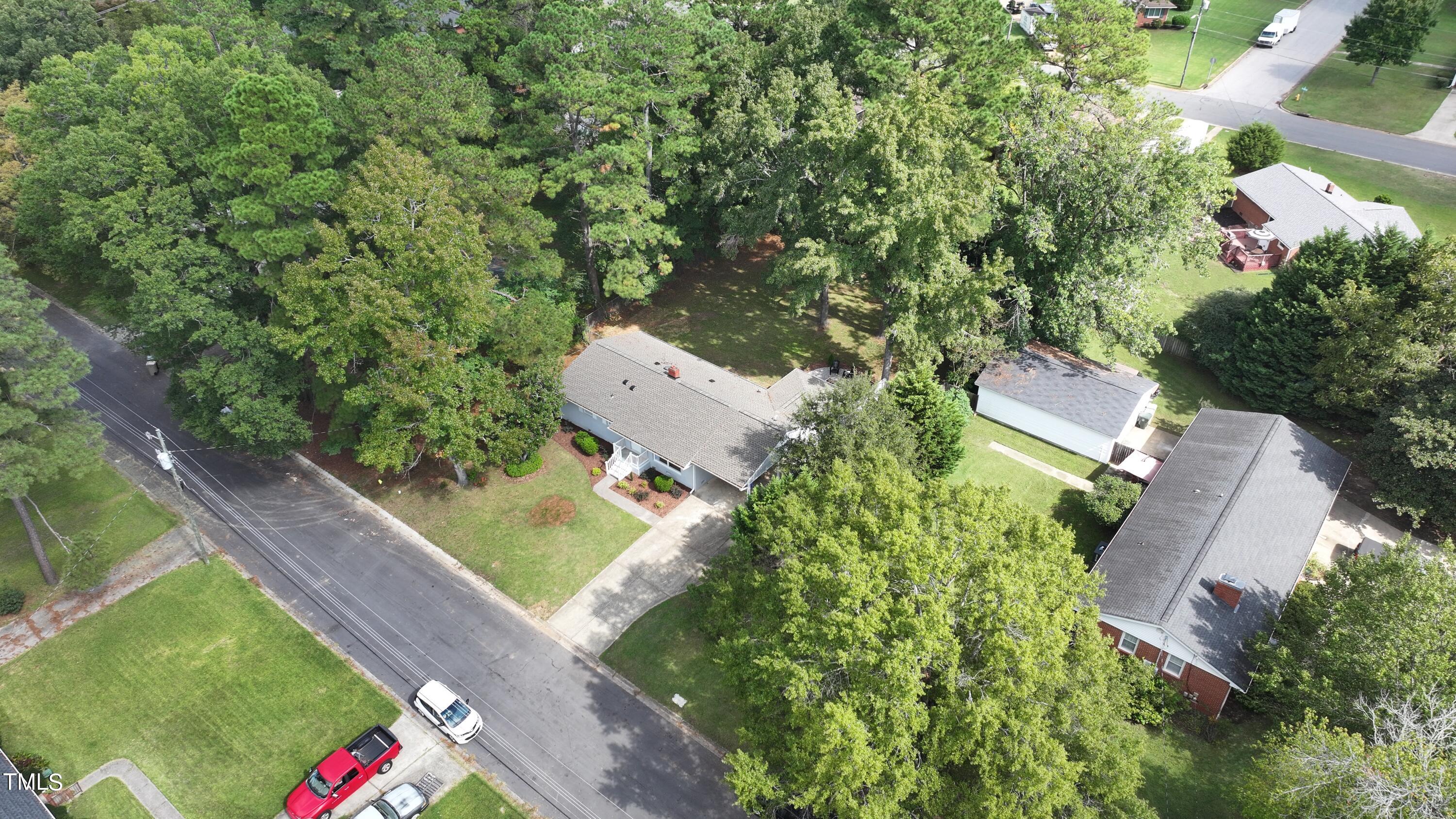 607 Nellane Drive Garner, NC 27529 - Photo 4 of 35 an aerial view of a house with outdoor space