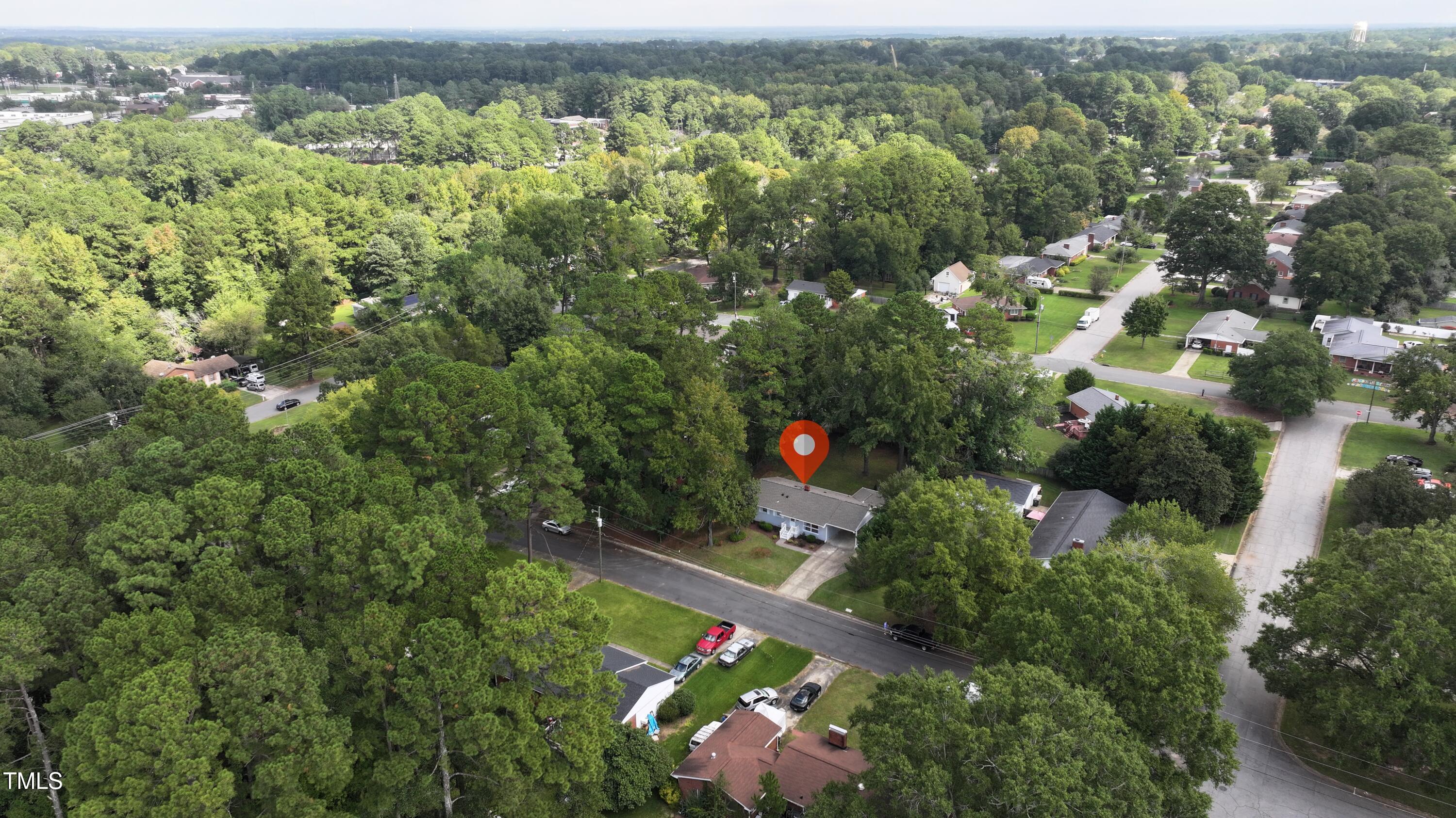 607 Nellane Drive Garner, NC 27529 - Photo 5 of 35 an aerial view of residential houses with outdoor space and trees