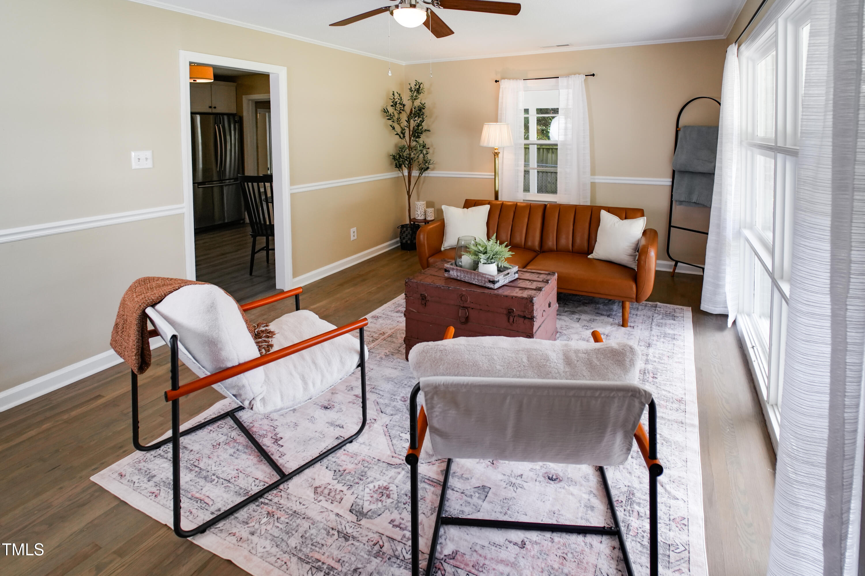 607 Nellane Drive Garner, NC 27529 - Photo 8 of 35 a living room with furniture and a potted plant