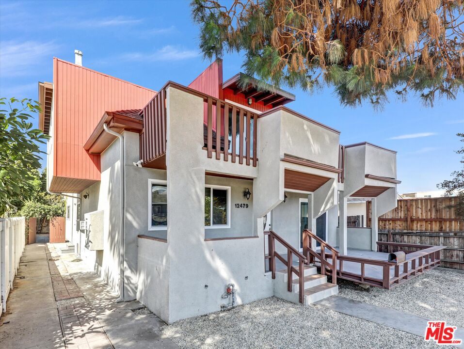 12479 Walsh Avenue Los Angeles, CA 90066 - Photo 1 of 21 a front view of a house with a tree