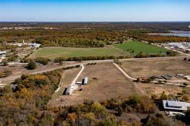 an aerial view of residential building and ocean