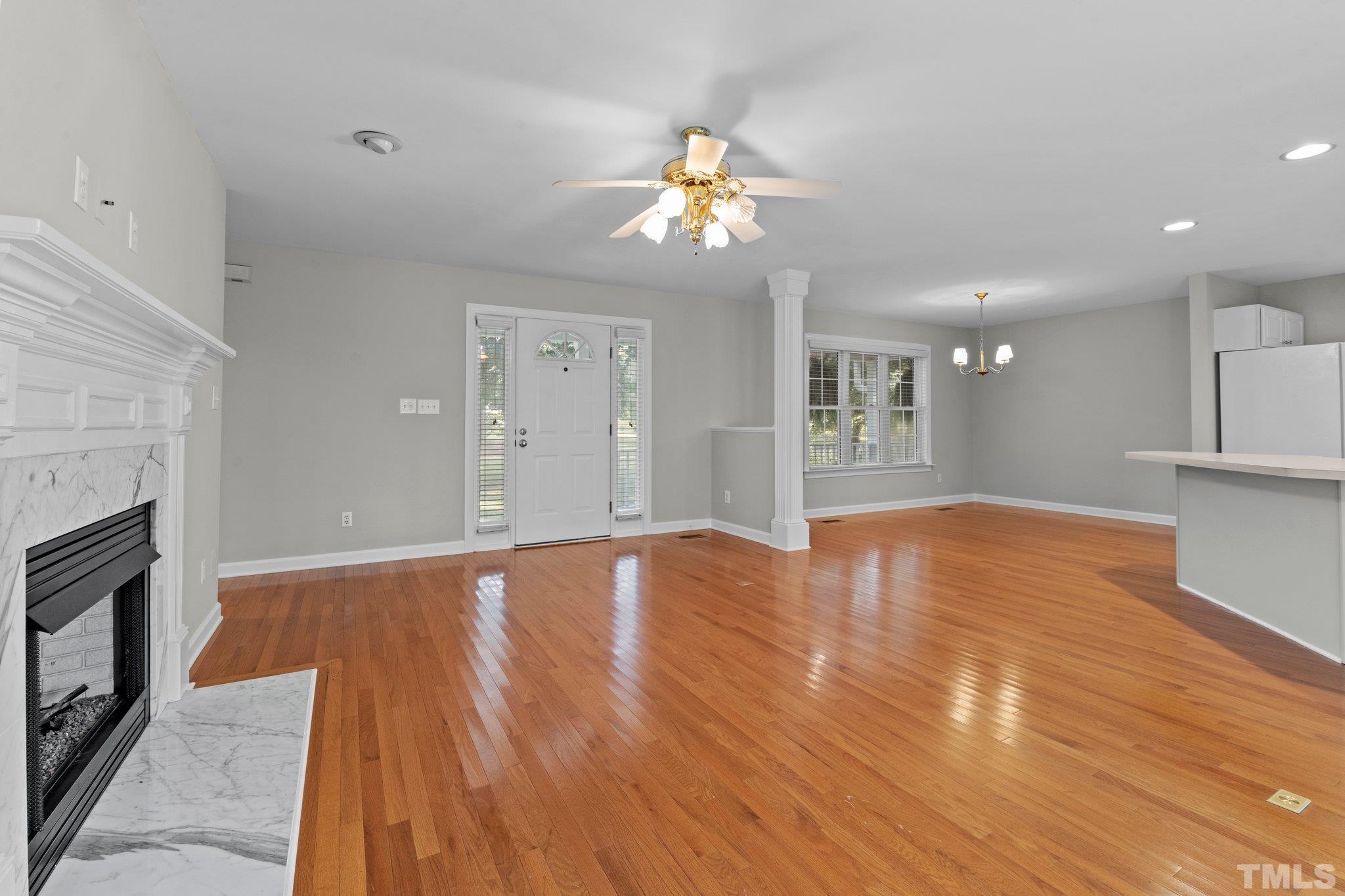 8025 Lockleair Road Zebulon, NC 27597 - Photo 15 of 30 View of living area from back of living room. Imagine entertaining friends or just relaxing with family in this wide open space. Fresh painted walls and Kitchen cabinets.