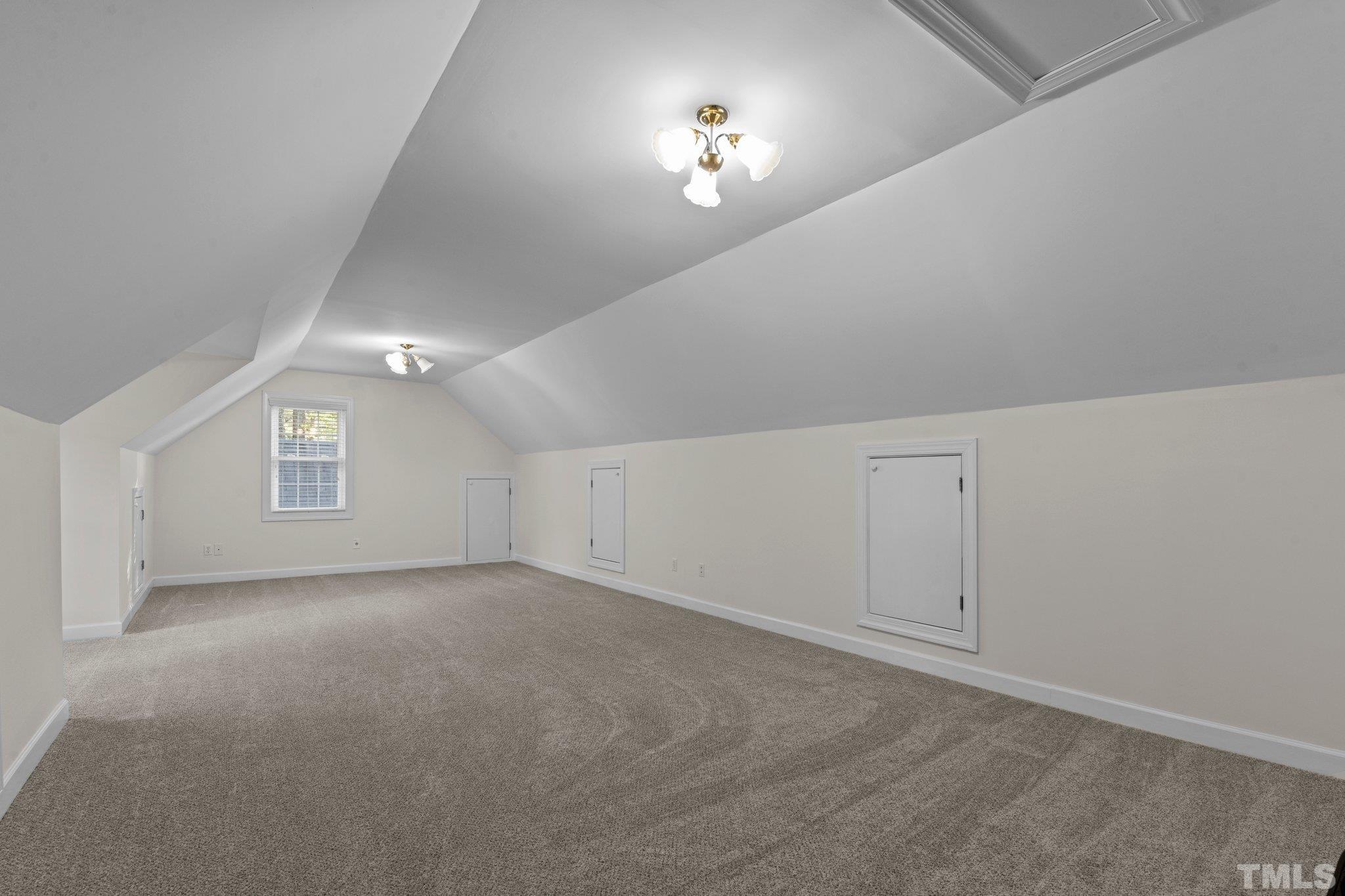 8025 Lockleair Road Zebulon, NC 27597 - Photo 29 of 30 Second floor unpermitted room used for home office. Needs HVAC for 4 season comfort. Flex room could be used as media room, bonus, playroom, office or combination of any.