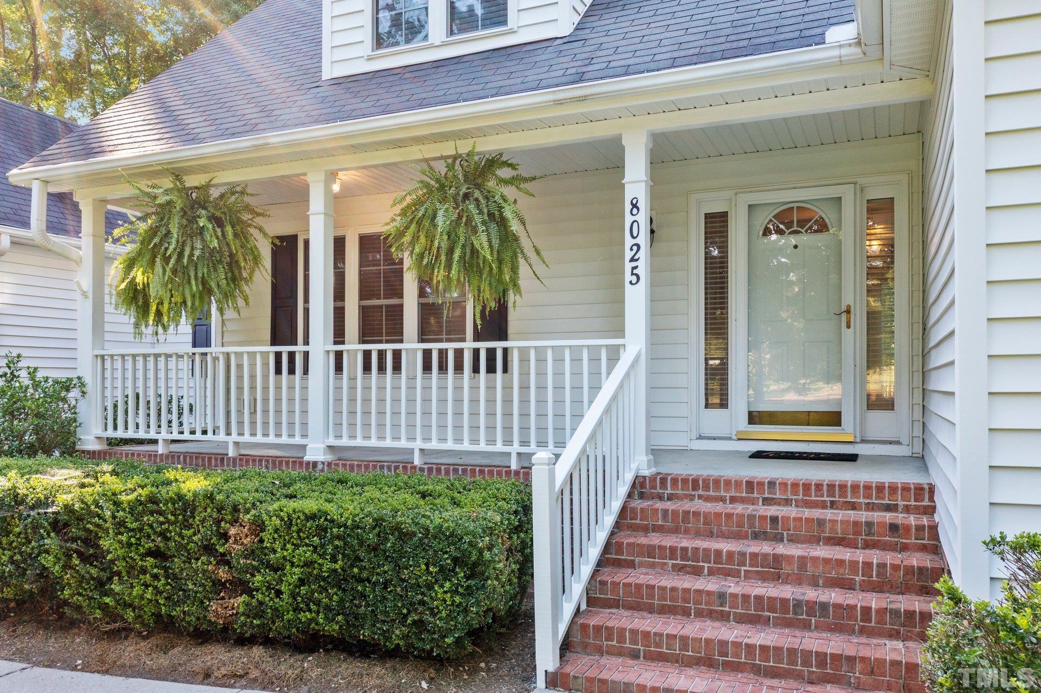 Spacious front porch welcomes your guest or simply nice to sit awhile and chat.