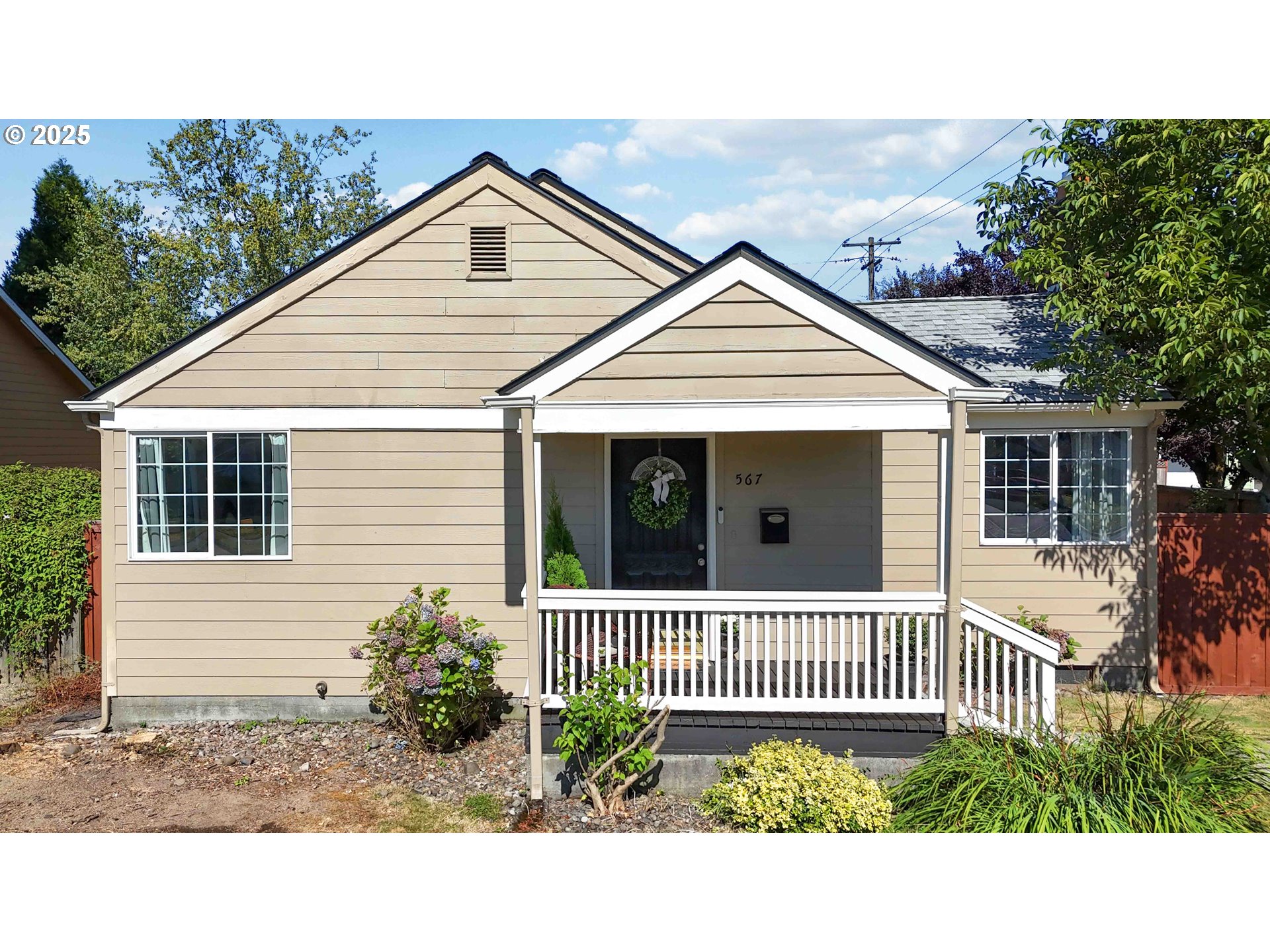 567 20th Avenue Longview, WA 98632 - Photo 1 of 41 a view of a house with a small yard
