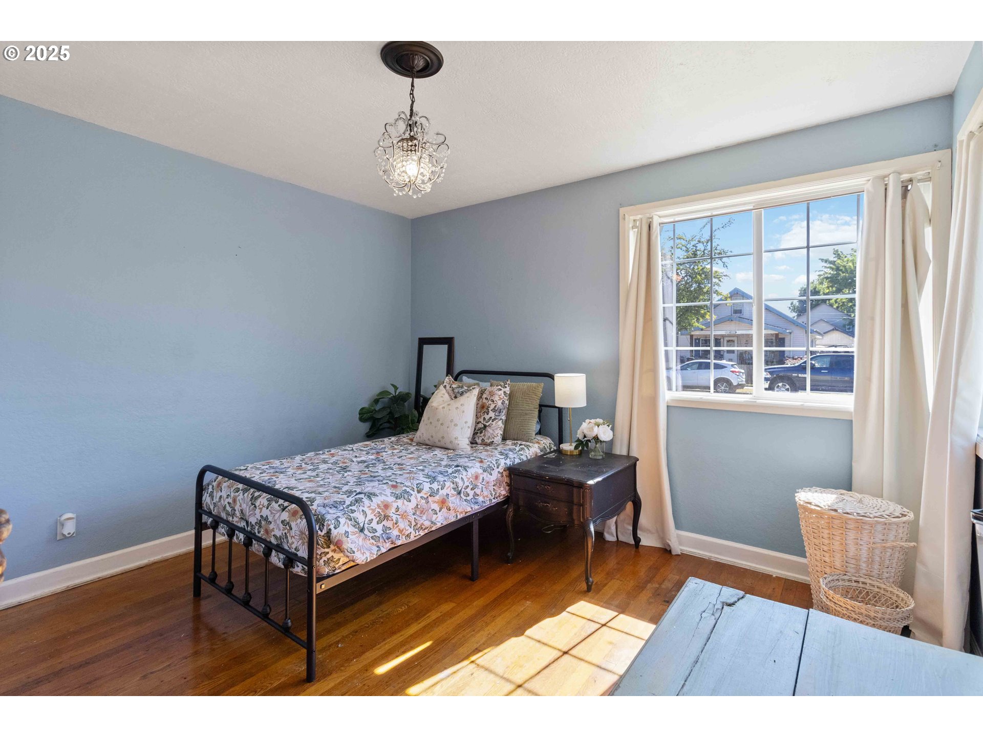 567 20th Avenue Longview, WA 98632 - Photo 17 of 41 a bedroom with a bed and a table