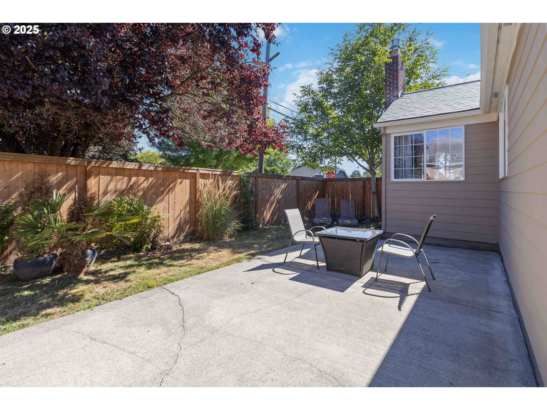 567 20th Avenue Longview, WA 98632 - Photo 28 of 41 a backyard of a house with outdoor seating