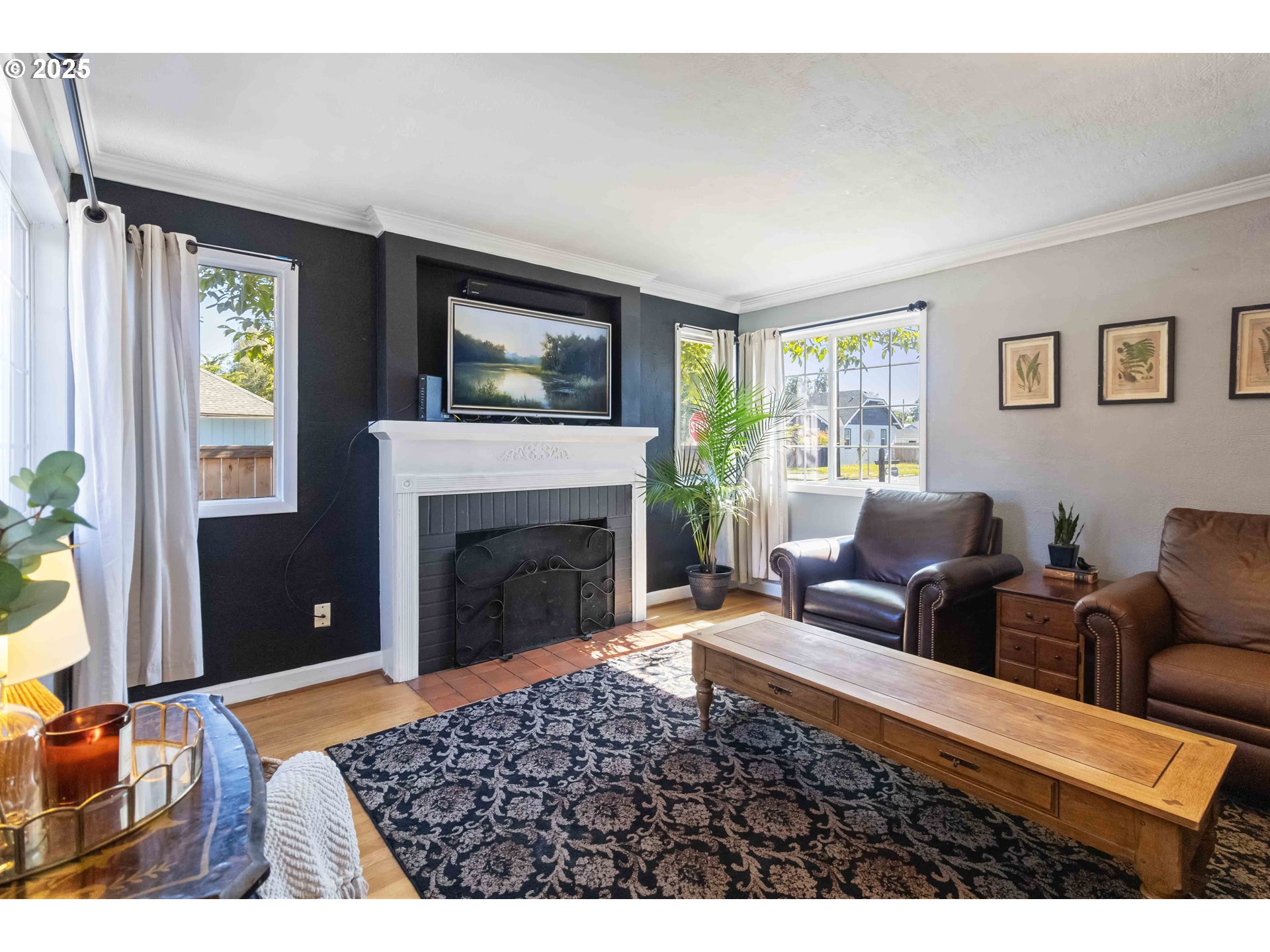 567 20th Avenue Longview, WA 98632 - Photo 7 of 41 a living room with furniture and a fireplace