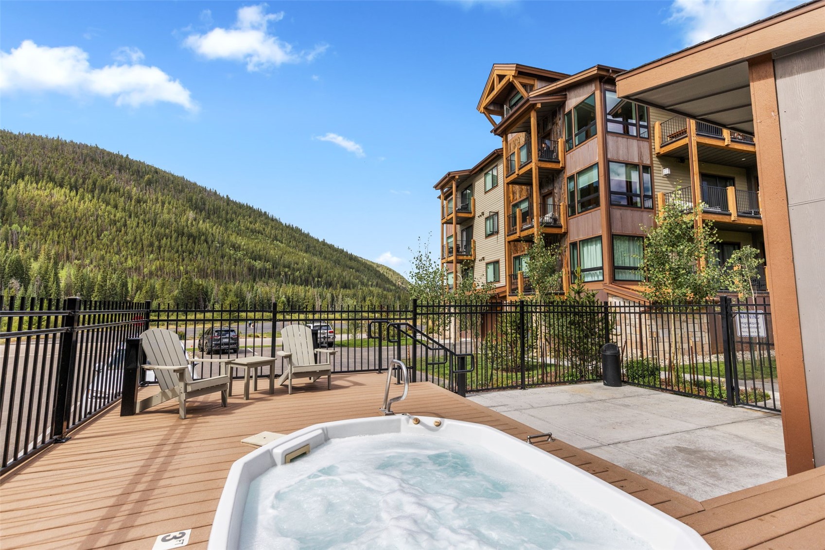 23 Clearwater Way, Unit 106 Keystone, CO 80435 - Photo 21 of 21 a balcony with table and chairs
