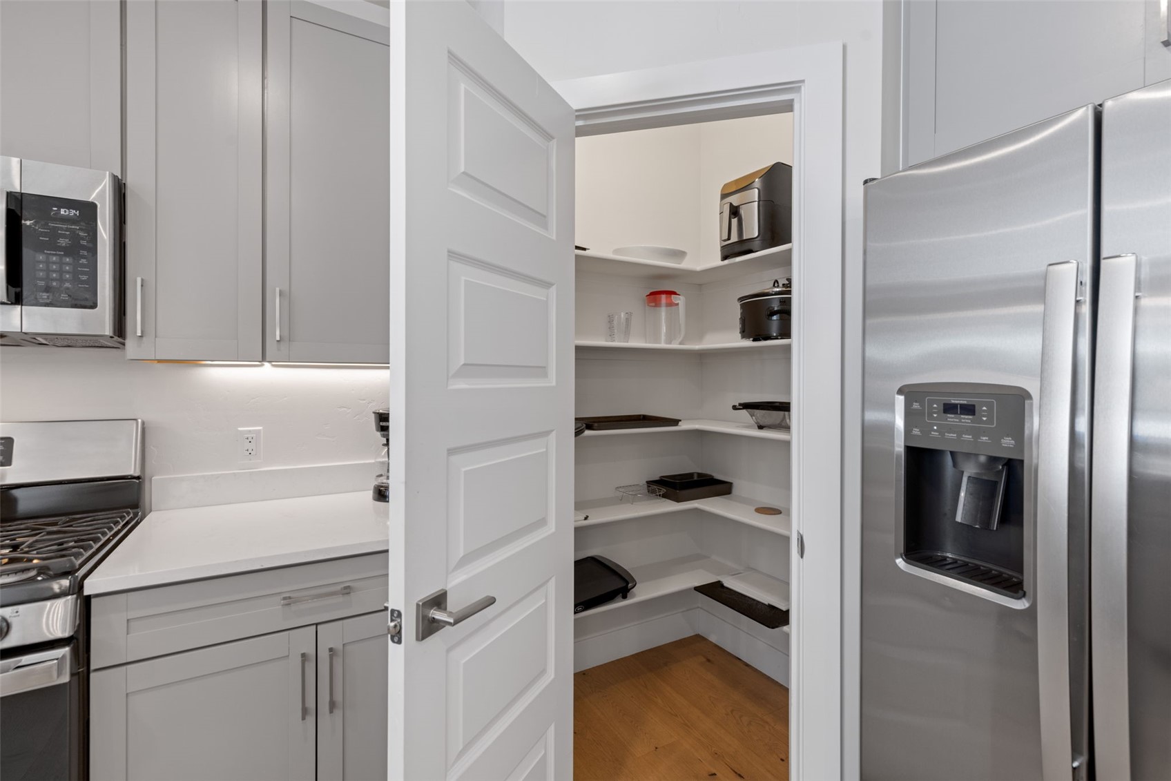 23 Clearwater Way, Unit 106 Keystone, CO 80435 - Photo 8 of 21 a kitchen with a refrigerator and cabinets