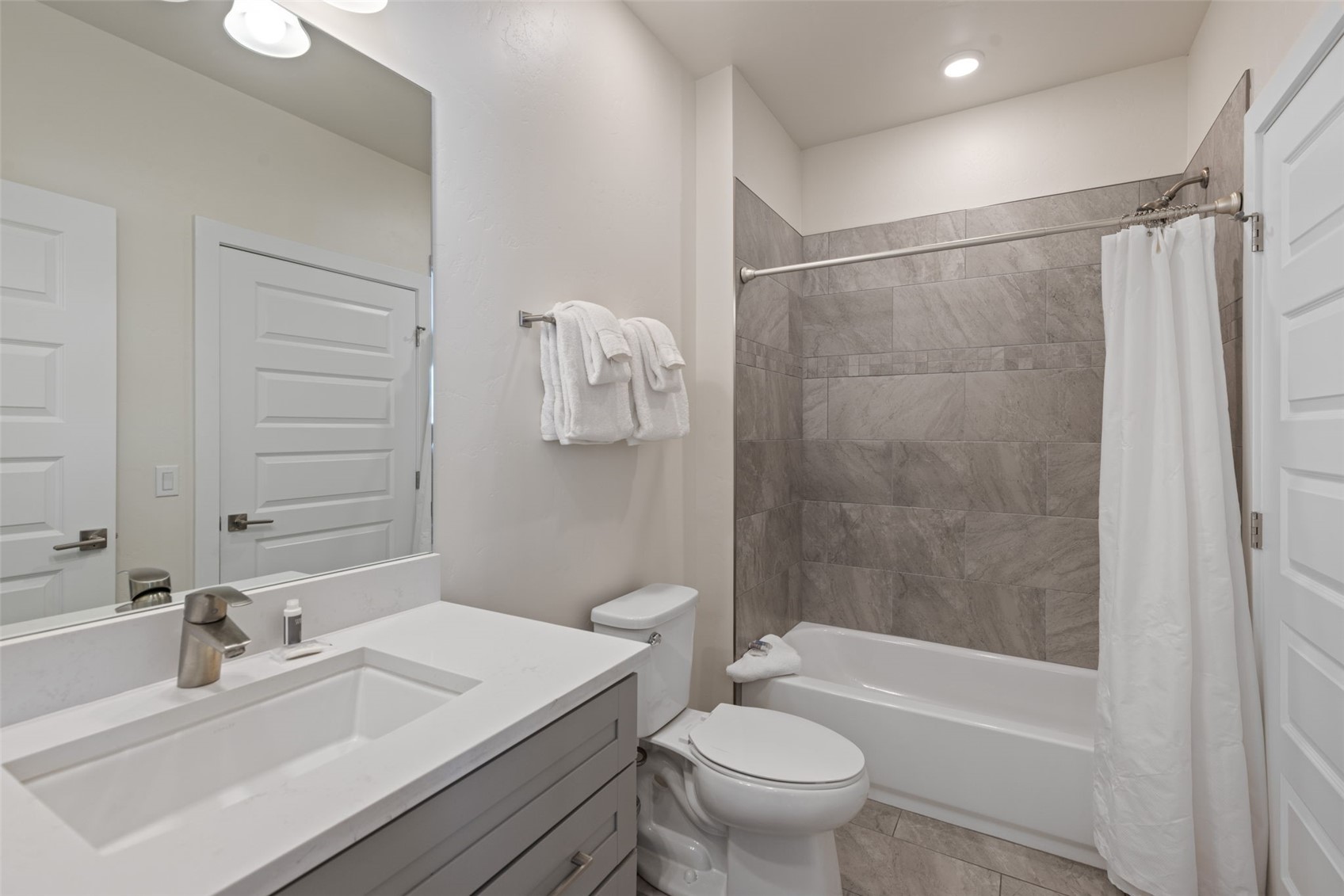 23 Clearwater Way, Unit 106 Keystone, CO 80435 - Photo 10 of 21 a bathroom with a sink toilet and shower