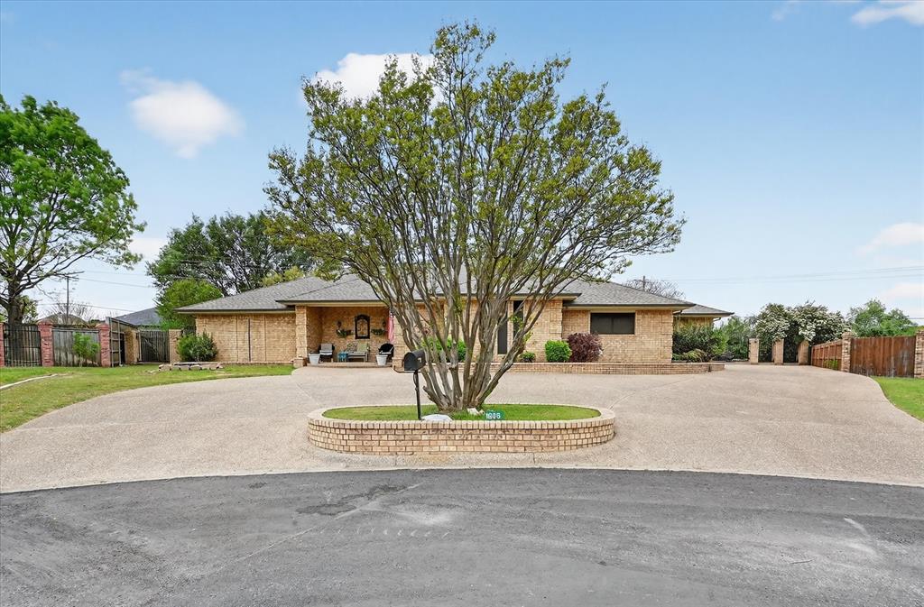 1605 Heather Court Cleburne, TX 76033 - Photo 2 of 33 a house view with a outdoor space