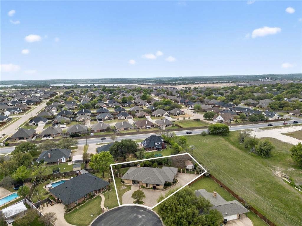 1605 Heather Court Cleburne, TX 76033 - Photo 31 of 33 an aerial view of residential houses with outdoor space