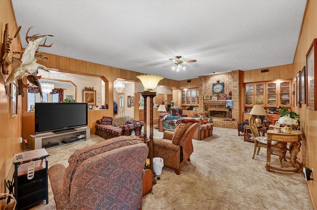 1605 Heather Court Cleburne, TX 76033 - Photo 6 of 33 a view of a livingroom with furniture and a flat screen tv
