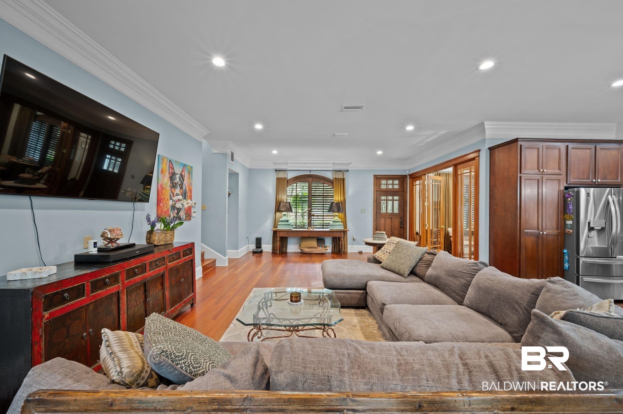 7850 Yorkhaven Road Mobile, AL 36695 - Photo 11 of 57 Living room featuring light wood-type flooring, visible vents, ornamental molding, recessed lighting, and baseboards