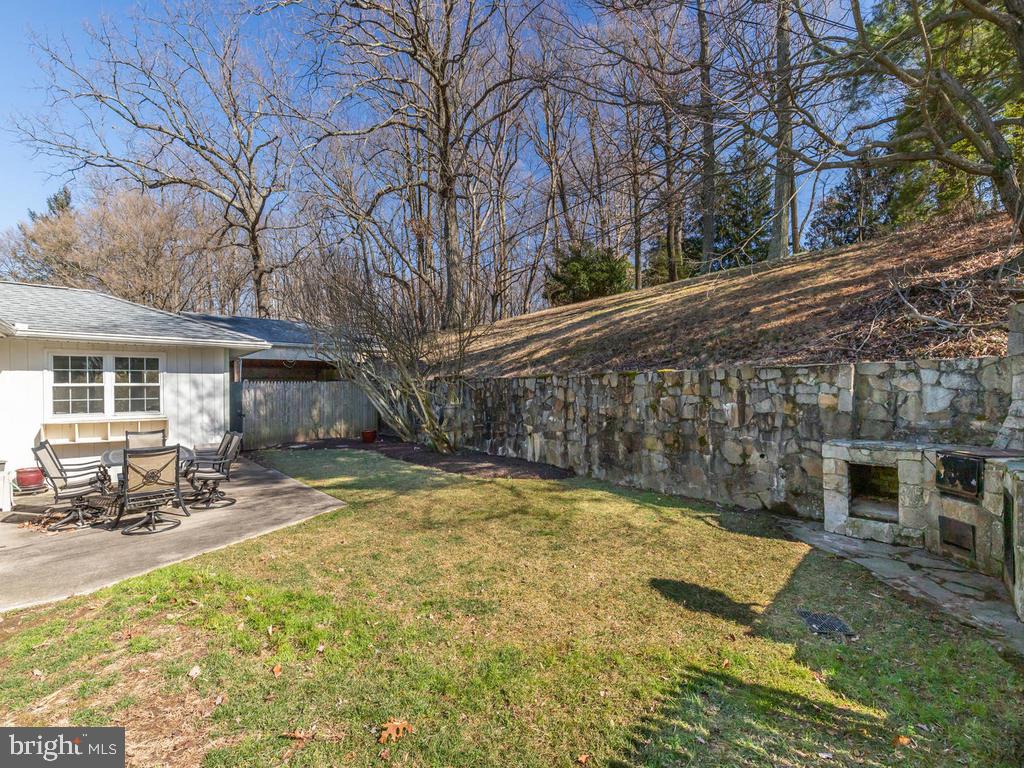 1907 Haverhill Road Baltimore, MD 21234 - Photo 43 of 47 Level backyard is lined by stone wall