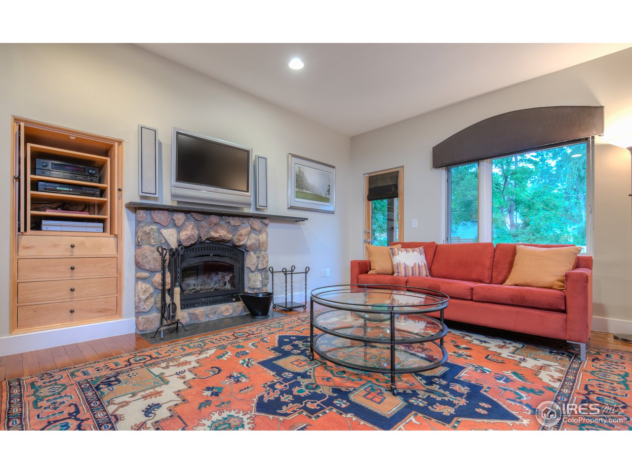 531 Hawthorn Avenue Boulder, CO 80304 - Photo 5 of 40 Living room w/ wood burning catalytic fireplace