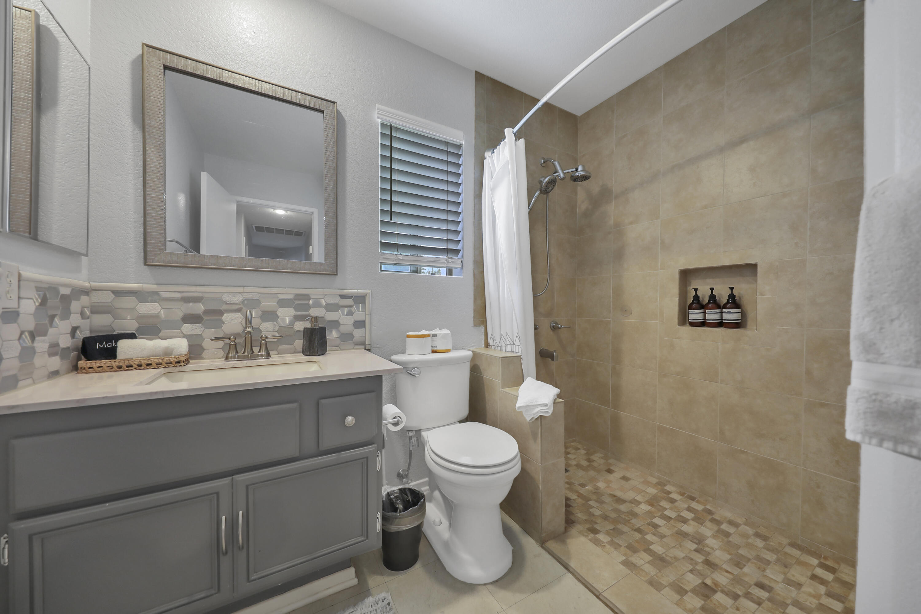 80490 Paseo Tesoro Indio, CA 92201 - Photo 15 of 28 a bathroom with a sink toilet and shower