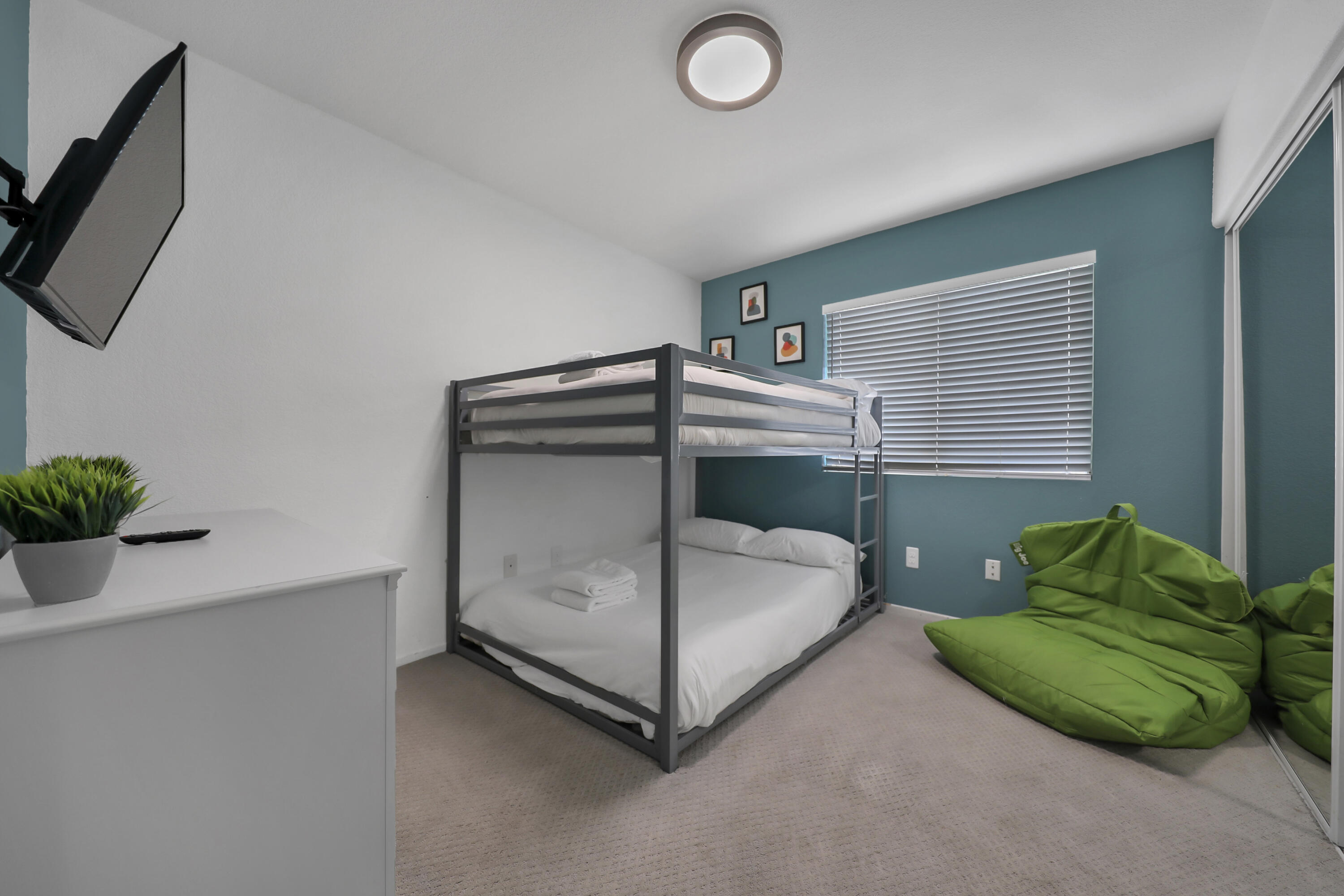 80490 Paseo Tesoro Indio, CA 92201 - Photo 16 of 28 a bedroom with a bed and a window