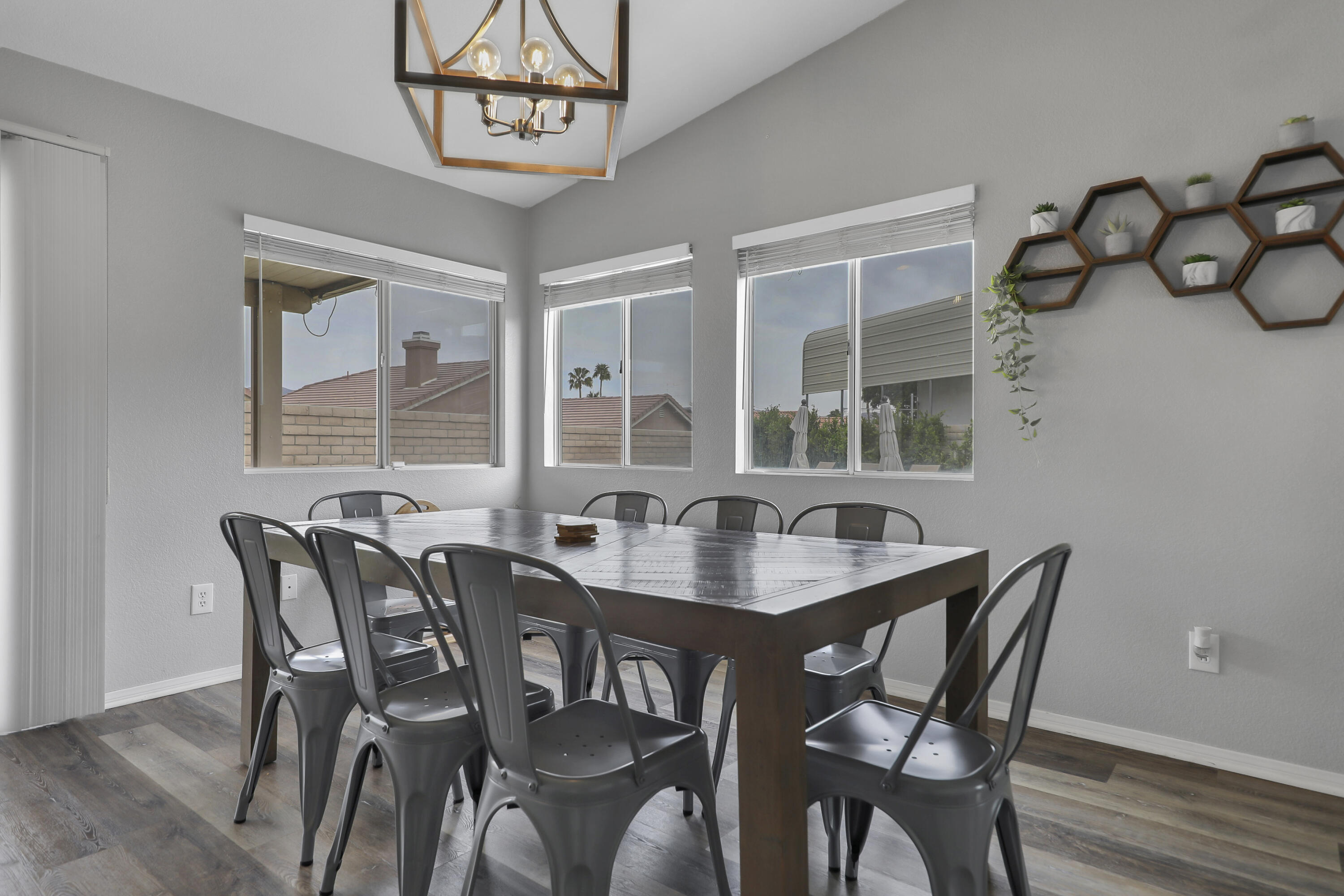 80490 Paseo Tesoro Indio, CA 92201 - Photo 8 of 28 a view of a dining room with furniture and a window
