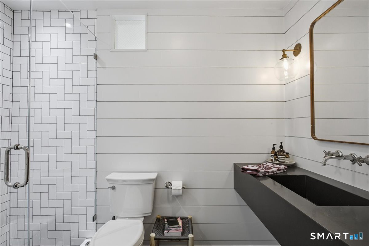 246 North Street Roxbury, CT 06783 - Photo 15 of 22 a bathroom with a sink and a toilet