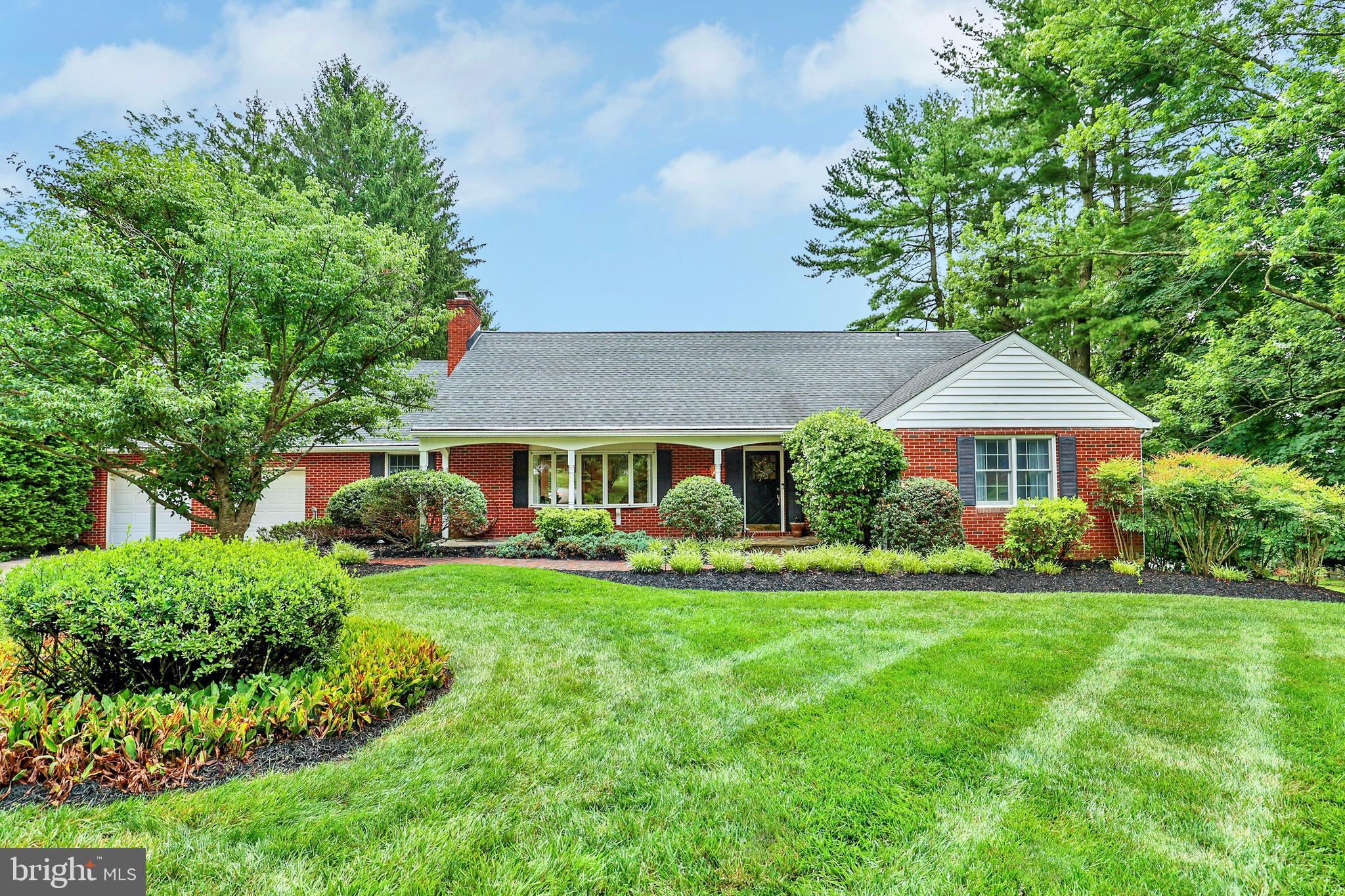 13713 Harcum Road Phoenix, MD 21131 - Photo 101 of 101 a front view of a house with garden