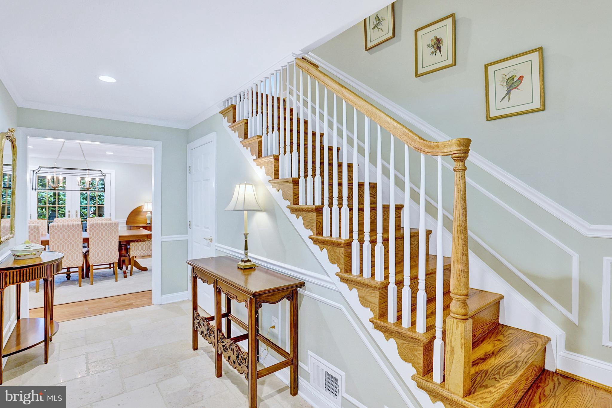 13713 Harcum Road Phoenix, MD 21131 - Photo 13 of 101 a view of staircase with furniture and a large window