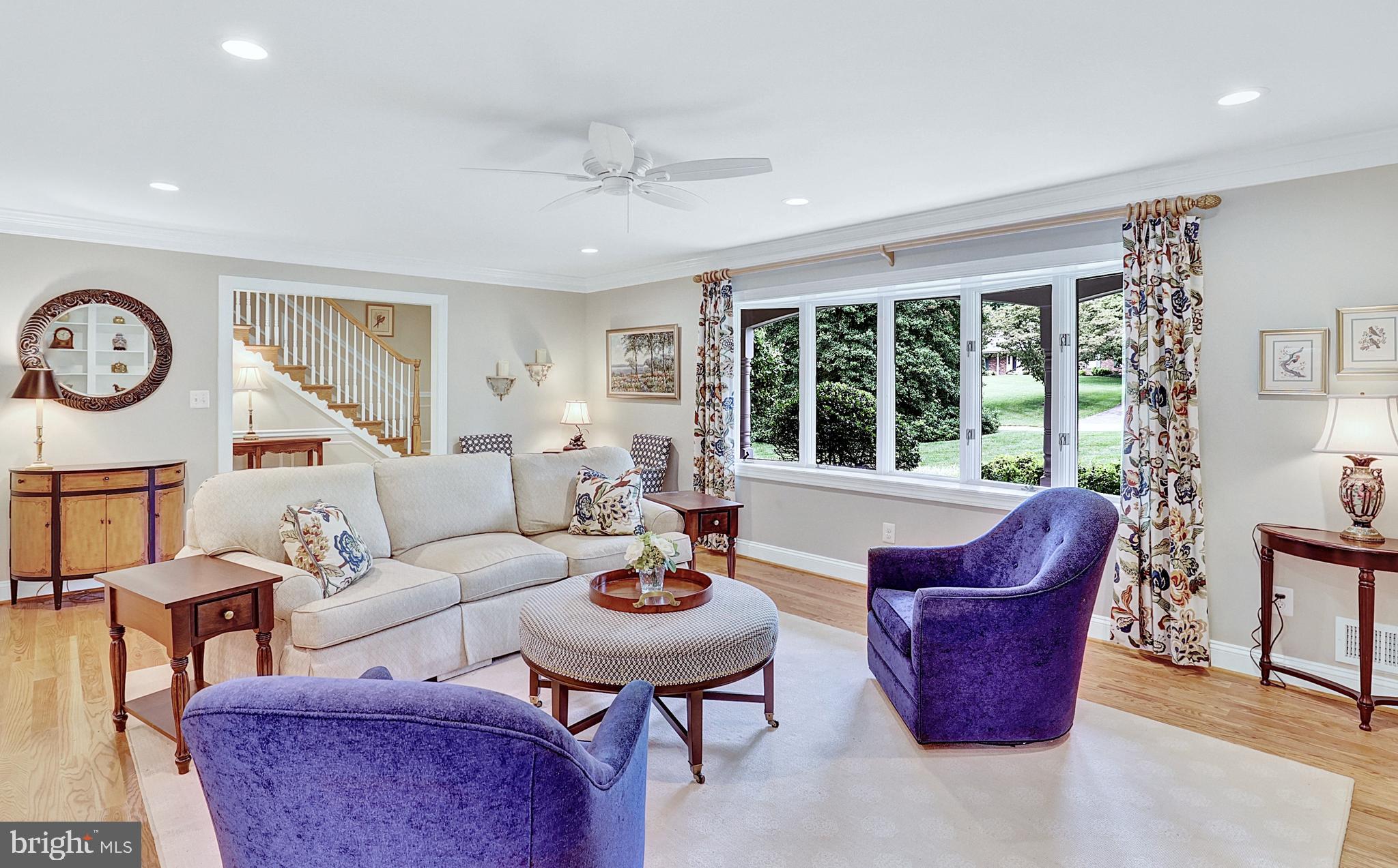 13713 Harcum Road Phoenix, MD 21131 - Photo 14 of 101 a living room with furniture a table and a large window