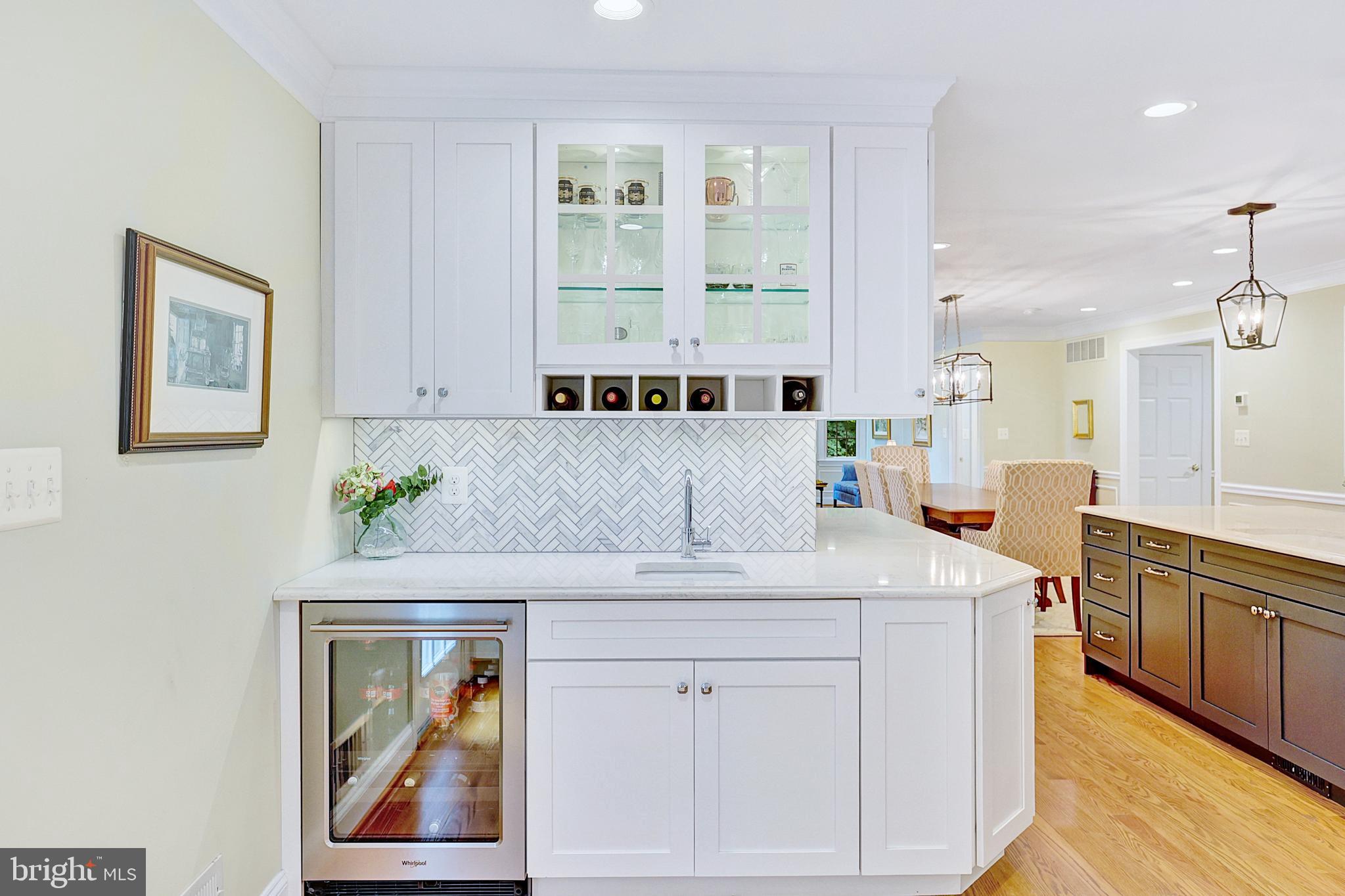 13713 Harcum Road Phoenix, MD 21131 - Photo 26 of 101 a view of cabinets a sink and a window in a room