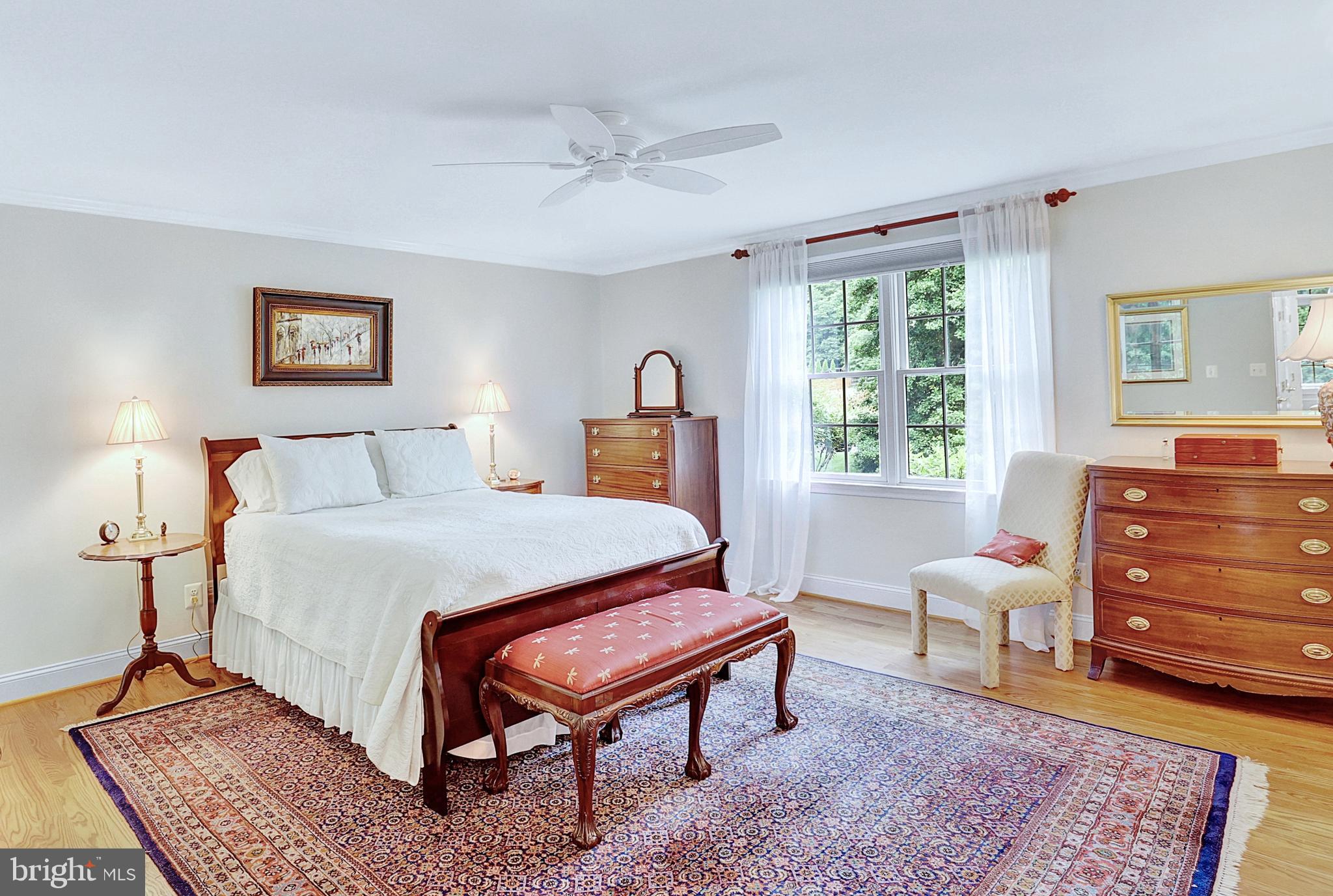 13713 Harcum Road Phoenix, MD 21131 - Photo 33 of 101 a bedroom with a bed and wooden floor