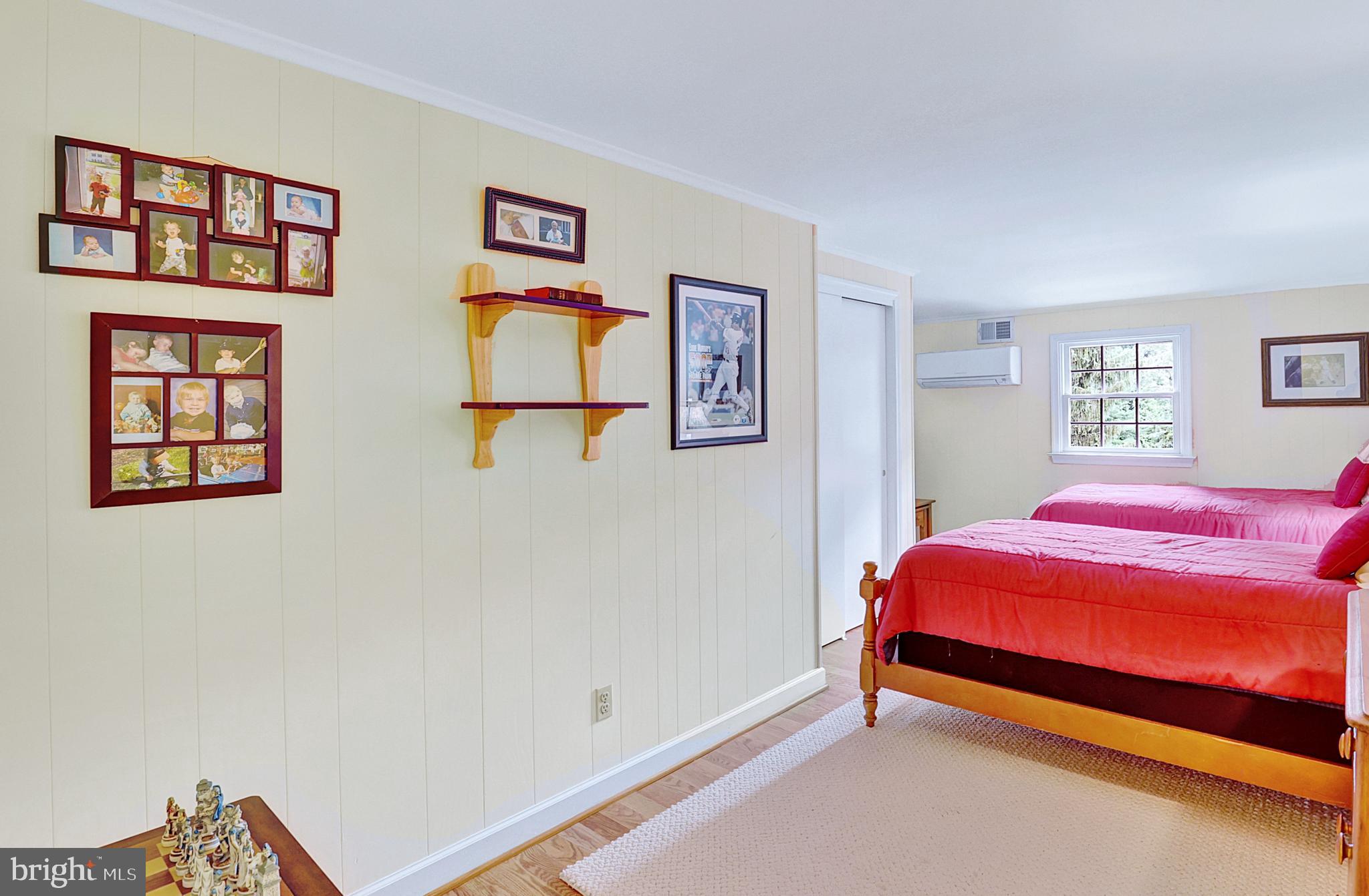13713 Harcum Road Phoenix, MD 21131 - Photo 48 of 101 a bedroom with a bed and a window