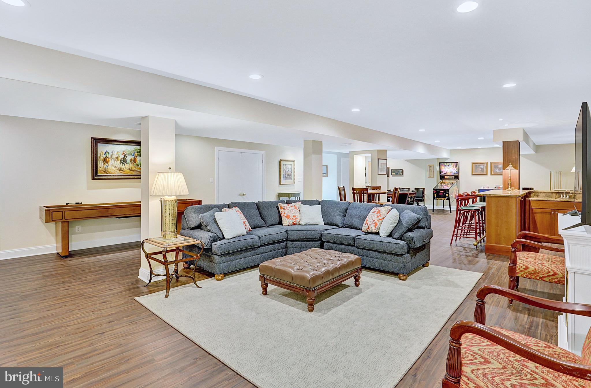 13713 Harcum Road Phoenix, MD 21131 - Photo 52 of 101 a living room with furniture and a table