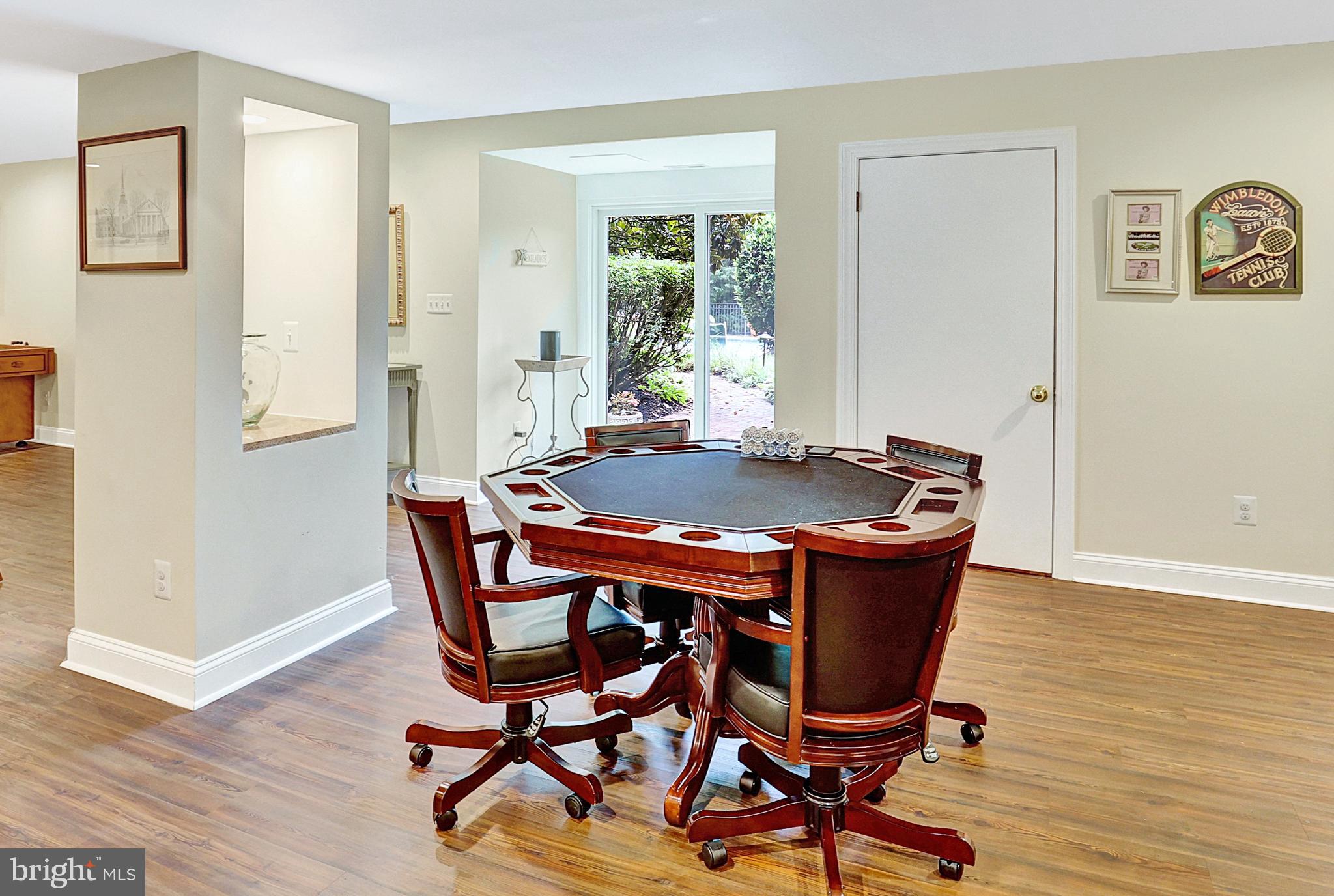 13713 Harcum Road Phoenix, MD 21131 - Photo 64 of 101 a view of a dining room with furniture and wooden floor