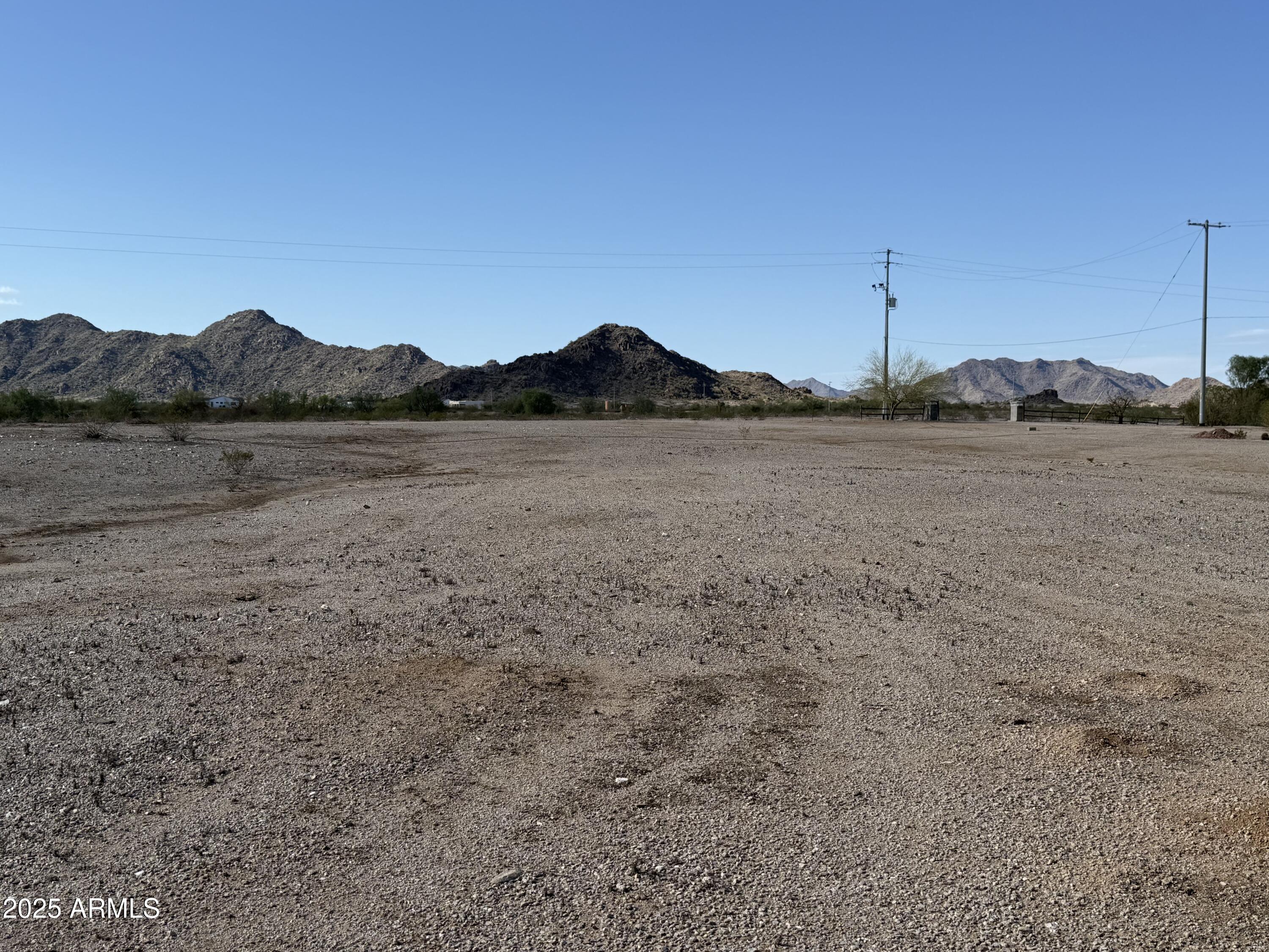0 West San Tan Road Buckeye, AZ 85326 - Photo 4 of 4 a view of a lake with a mountain in the background