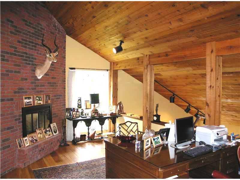 129 Riding Trail Lane Fox Chapel, PA 15215 - Photo 14 of 25 Studio/Study/Office. Adjacent to the Master Suite and open to the Living room below, the Loft Study offers exposed brick, a fireplace, and a planked vaulted ceiling.