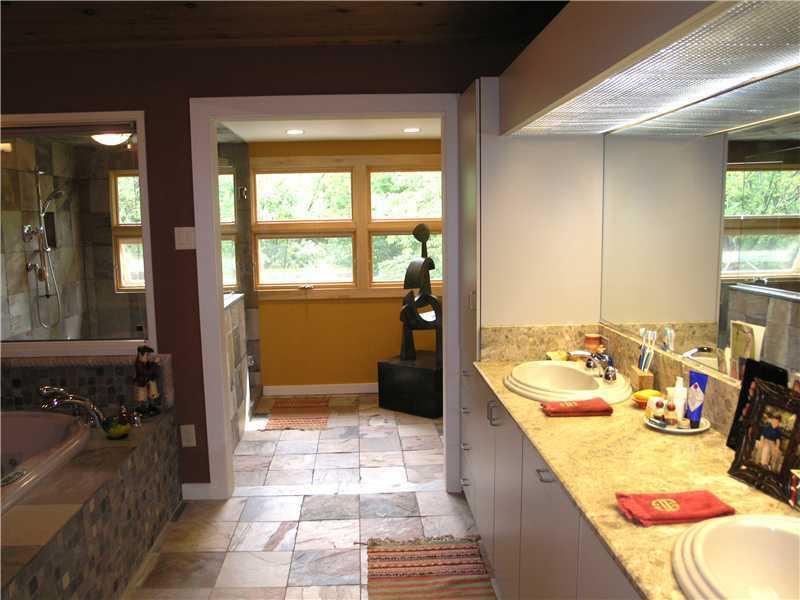 129 Riding Trail Lane Fox Chapel, PA 15215 - Photo 16 of 25 Master Bath/Spa. Relax in the soaking tub offered in the Master Bath, with double sinks, lots of storage and earth tone tile.