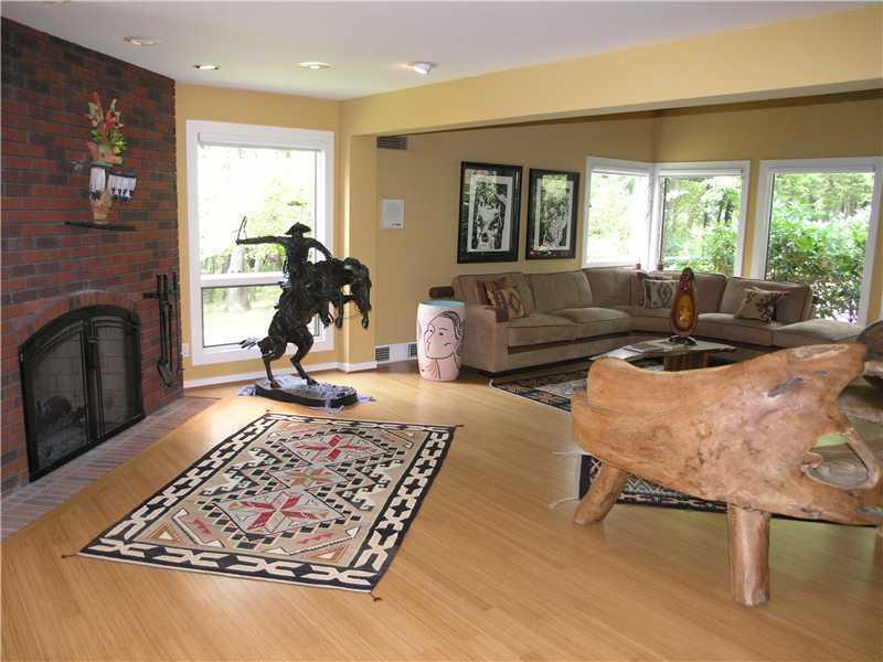 129 Riding Trail Lane Fox Chapel, PA 15215 - Photo 3 of 25 Living Room. Exceptional Living Room with floor to ceiling windows, new bamboo flooring, exposed brick, and fireplace is a stunning location to entertain or simply curl up and enjoy.