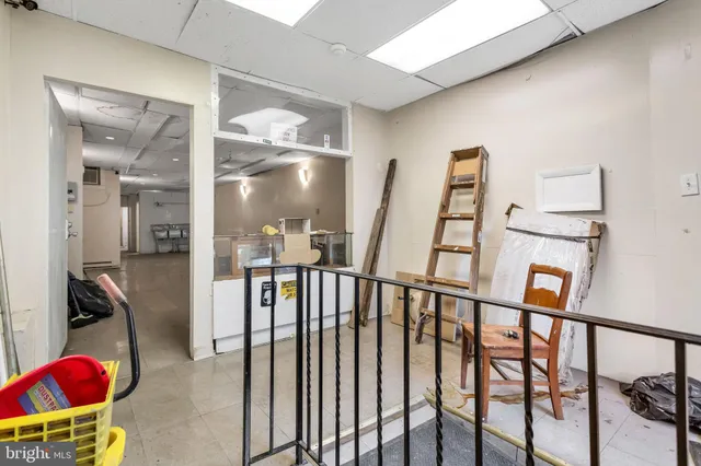 workspace with wooden floor and windows