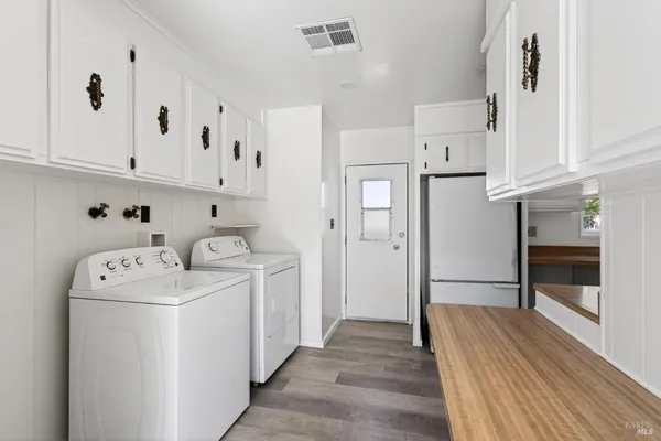 a view of kitchen and washer and dryer