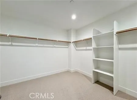 a view of an empty walk in closet
