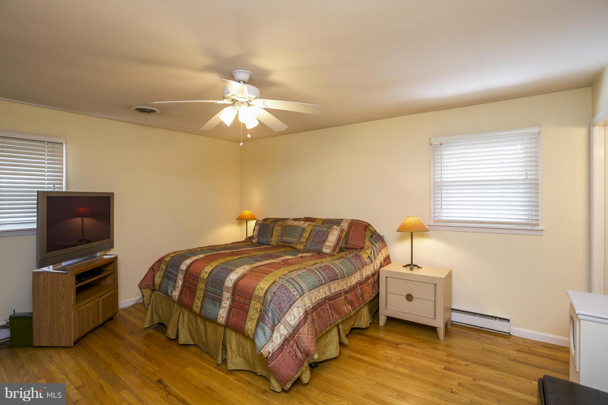 1712 Parkvue Road Fallston, MD 21047 - Photo 11 of 29 a bedroom with a bed and a tv