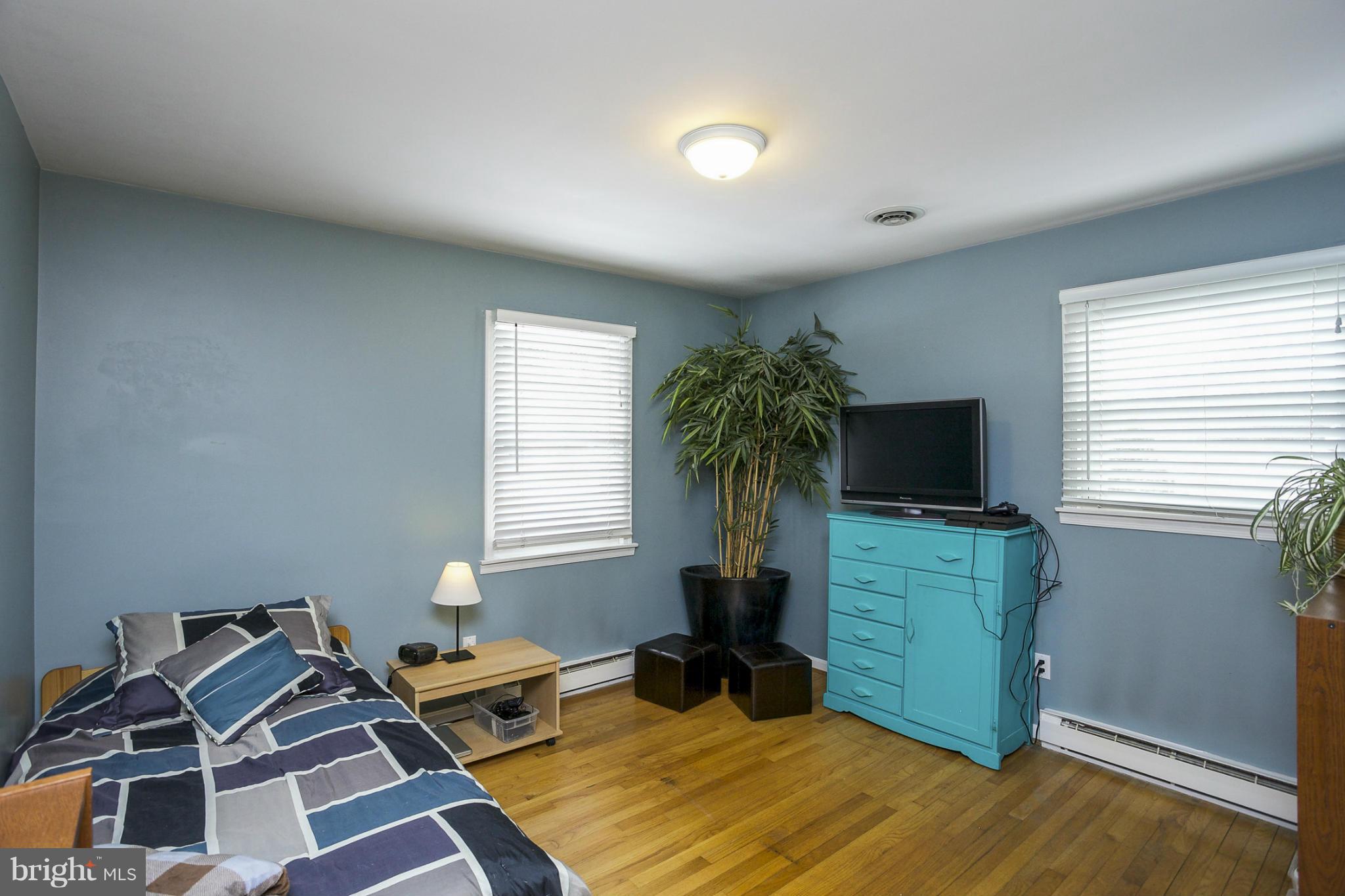 1712 Parkvue Road Fallston, MD 21047 - Photo 15 of 29 a bedroom with furniture and a flat screen tv
